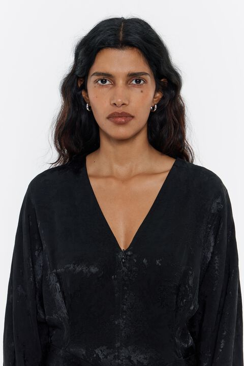 Mono fluido jacquard negro Mono fluido jacquard negro
