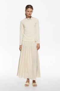 Falda midi l&iacute;nea A pliegues vainilla