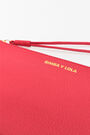 Neceser sobre piel rojo Neceser sobre piel rojo