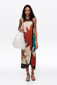 Vestido midi cruzado con flecos Sun positional