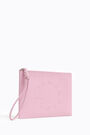 Neceser sobre piel rosa Neceser sobre piel rosa