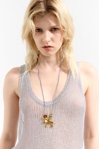 Collar largo cord&oacute;n trenzado con motivos metal dorado