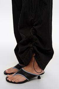 Pantal&oacute;n fruncido jogger negro