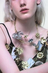 Collar hojas y espejos dorado