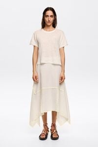 Falda midi irregular bordados crema Falda midi irregular bordados crema