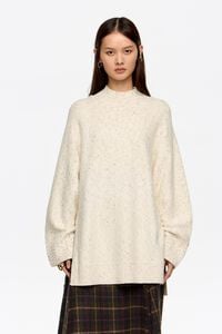 Jersey neps aberturas laterales marfil