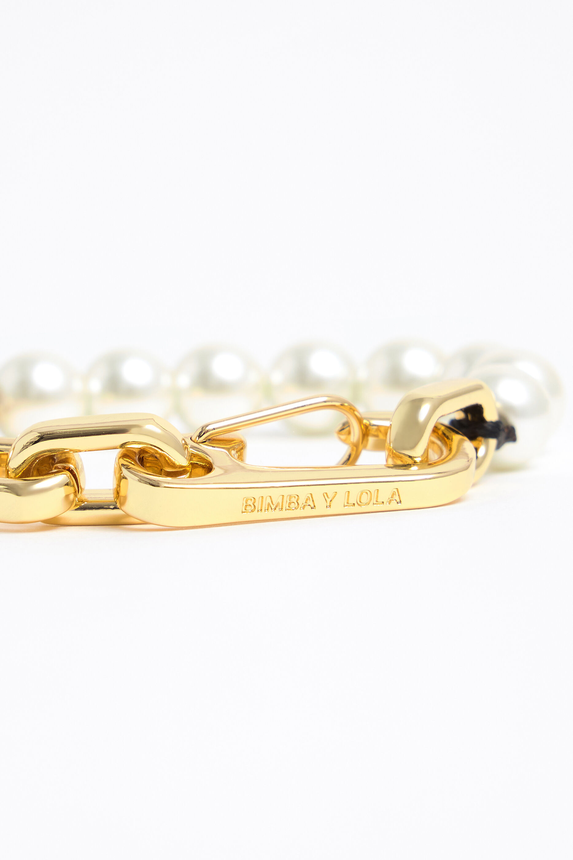 Pulsera perlas eslabones dorados