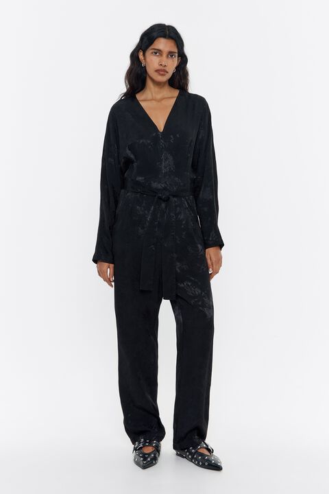 Mono fluido jacquard negro Mono fluido jacquard negro