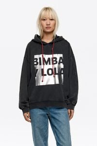 Sudadera oversize logo negro lavado