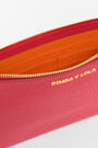 Neceser sobre piel rojo Neceser sobre piel rojo