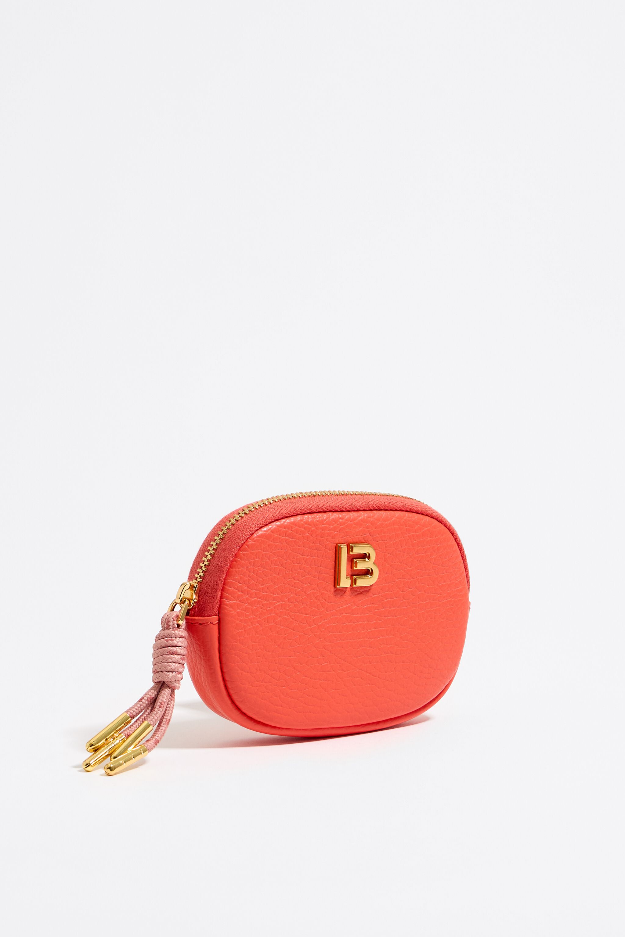 Monedero ovalado piel coral