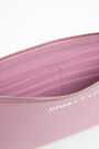 Neceser sobre piel rosa Neceser sobre piel rosa